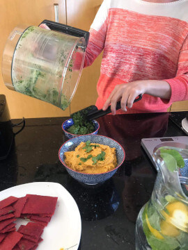 Cooking demo beetroot crackers, carrot hummus, wild garlic and carrot top pesto