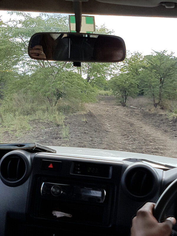 Driving along a dirt road in rural Zambia.