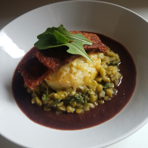 Seitan with creamy potatoes and red wine jus.